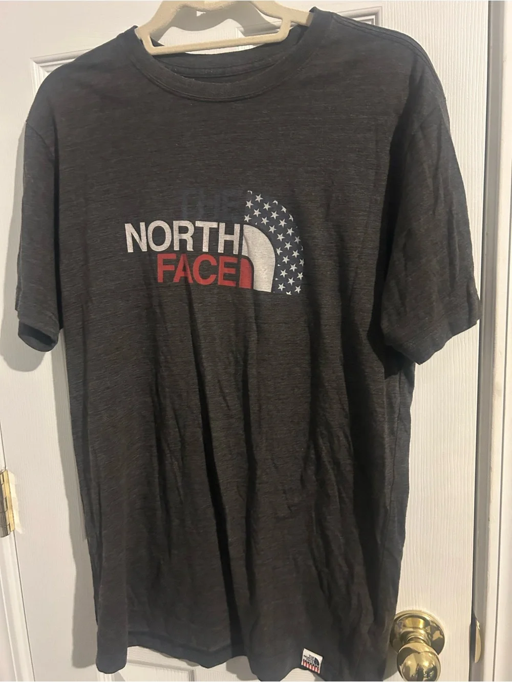 The North Face Men's Black Short Sleeve Logo Tee with Red & White Accents